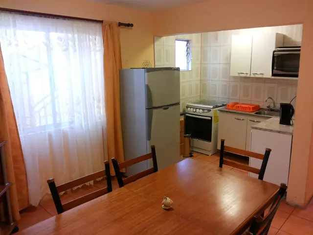 Comedor y cocina del departamento